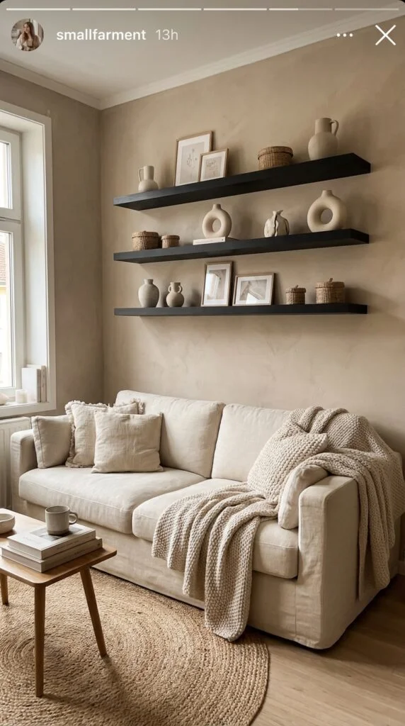 10. Matte Black Shelving with Beige Decor Accents